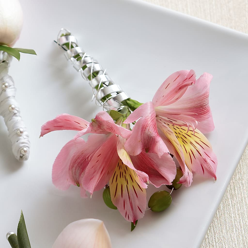Pink Peruvian Lily Boutonniere – ROCKY'S FLOWERS, West Terre Haute IN